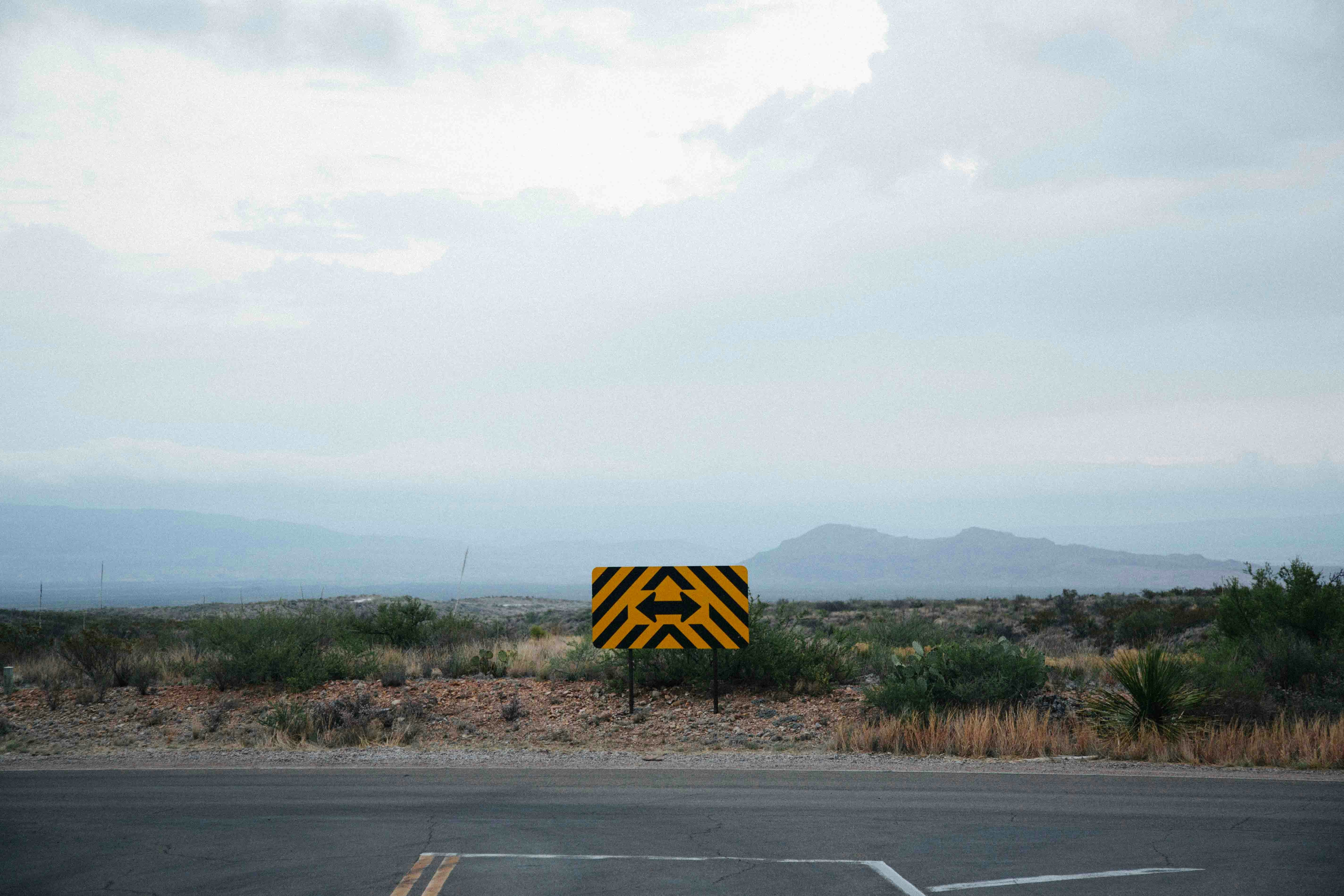 Road with two arrows at the end