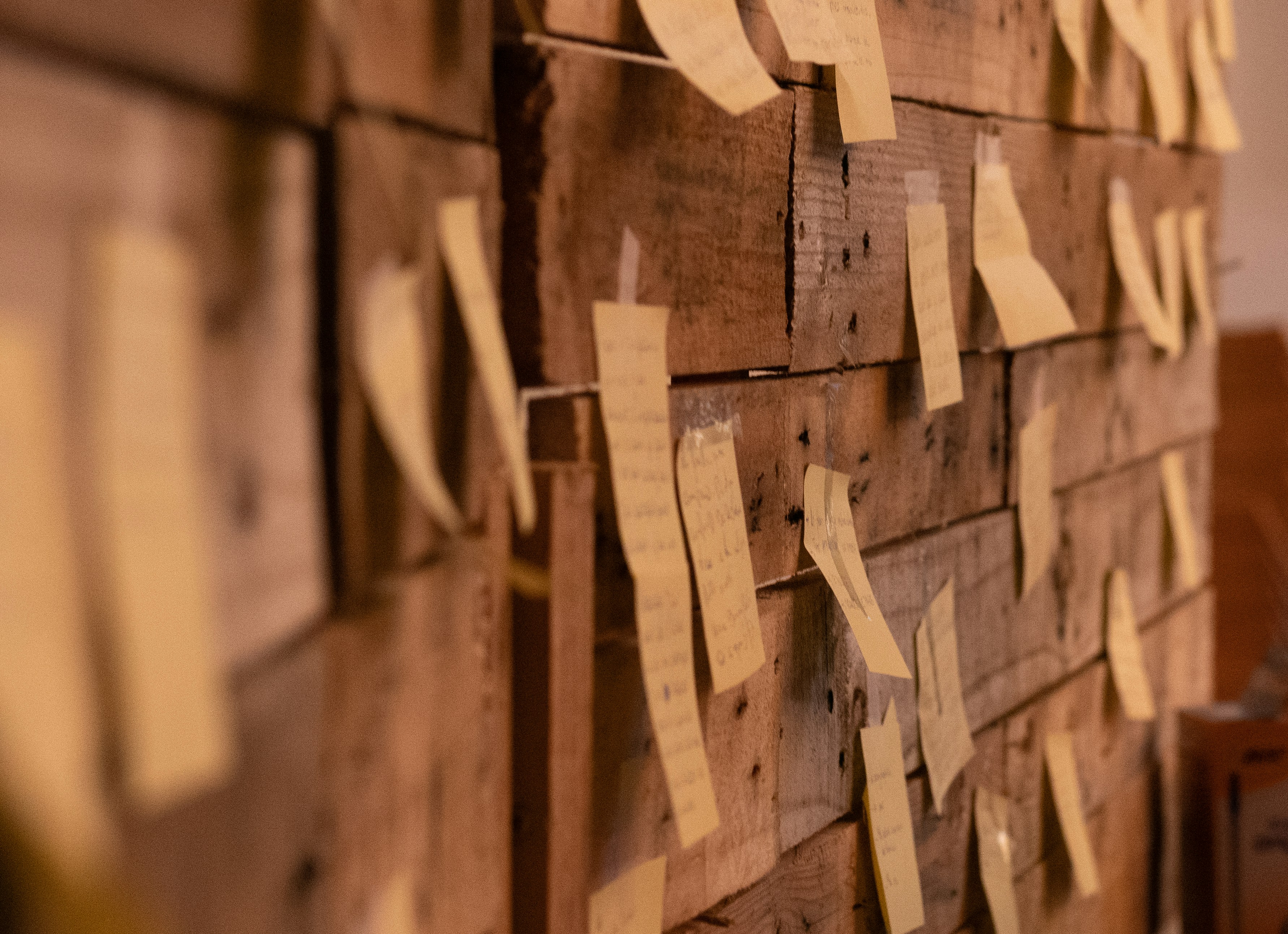 Sticky notes on a wood board